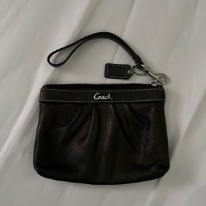Coach small black leather wristlet. Used.